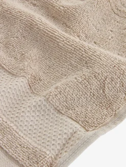 NORAGoldServiette de toilette NORA 50x100 sable