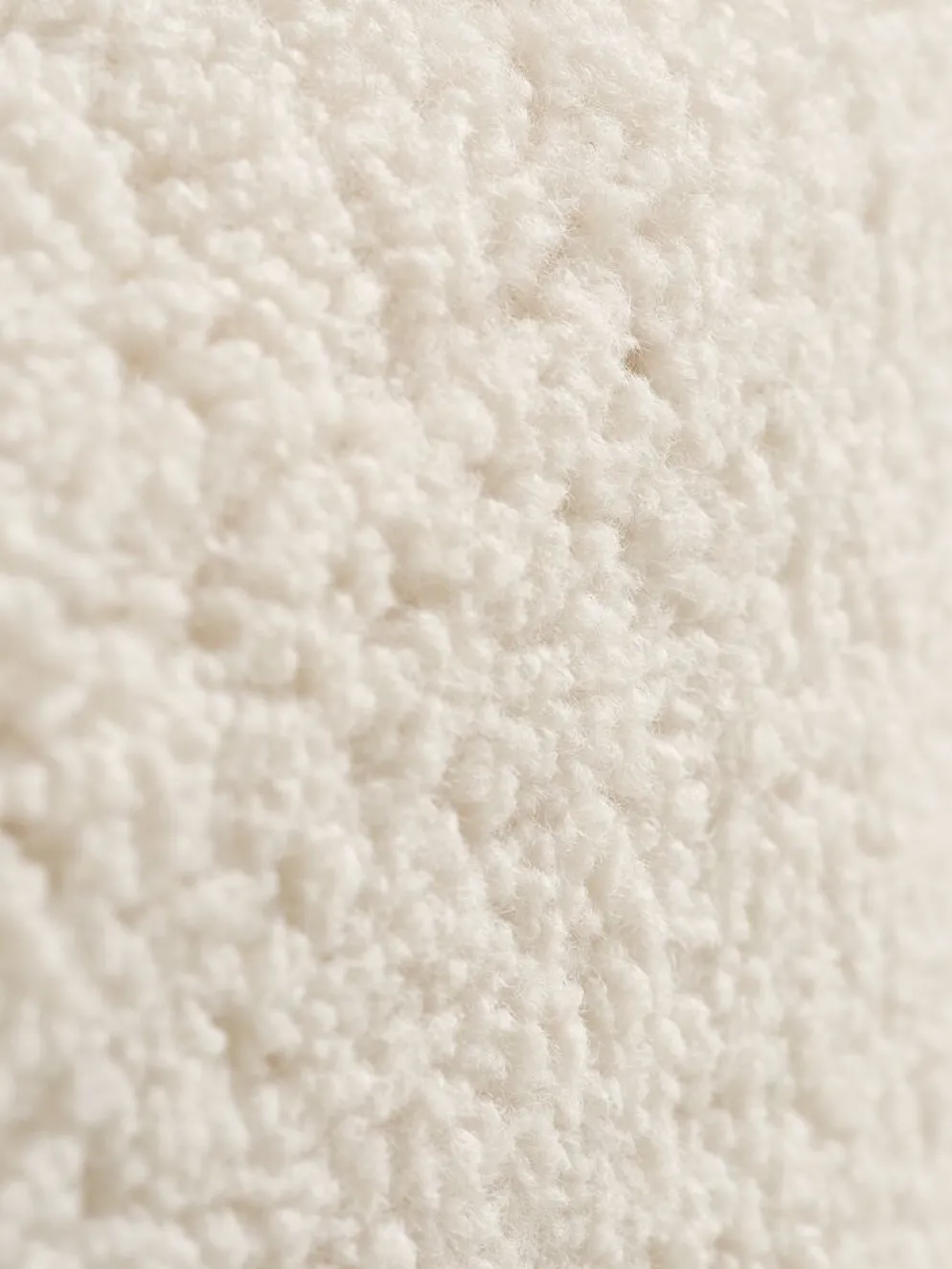 OREBOPouf OREBO 84x45 tissu teddy blanc cassé